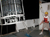 Just before midnight, Fred Andrus, helps to lower the 2400 lb CTD over the ships starboard side.