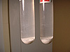 zinc sulfide collected in the bottom of test tubes