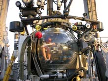 Lee Frey tests connections in preparation for launch of the Johnson-Sea-Link submersible. Lee Frey tests connections in preparation for launch of the Johnson-Sea-Link submersible.