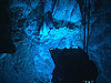 Hercules illuminates and photographs the IMAX Tower of Lost City.