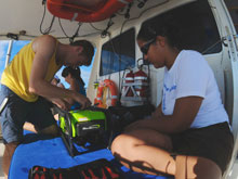 Todd Hallenbeck and Alexis Hall work together to troubleshoot and fix a minor problem with the ROV’s thrusters.