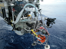 The HBOI/FAU Johnson Sea Link submersible being lowered into the water on its way to deploy the Eye-in-the-Sea. Eye-in-the-Sea