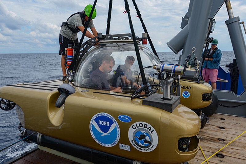 BOEM Archaeologist Willie Hoffman and pilot Randy Holt prepare for a submersible dive.