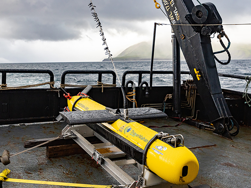 The project makes use of the AquaPix Miniature Interferometric Synthetic Aperture Sonar (MINSAS) (Kraken Robotics). The MINSAS sensors are integrated into a SeaScout-2 system (pictured here), which is owned and operated by ThayerMahan, Inc. Three sets of MINSAS arrays are stacked along each side of the actively stabilized SeaScout-2 towfish. In this configuration, the system can achieve range independent resolution (up to 3x3 centimeters or about 1.2x1.2 inches) at a speed of up to 8 knots.