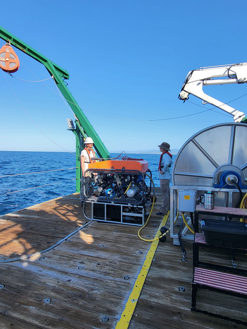The team on Research Vessel F.G. Walton Smith prepares for the first remotely operated vehicle (ROV) dive of Exploration of Deepwater Habitats off Puerto Rico and the U.S. Virgin Islands for Biotechnology Potential. During the expedition, the Mohawk ROV was used to collect sponge and coral samples as well as video and still photos.