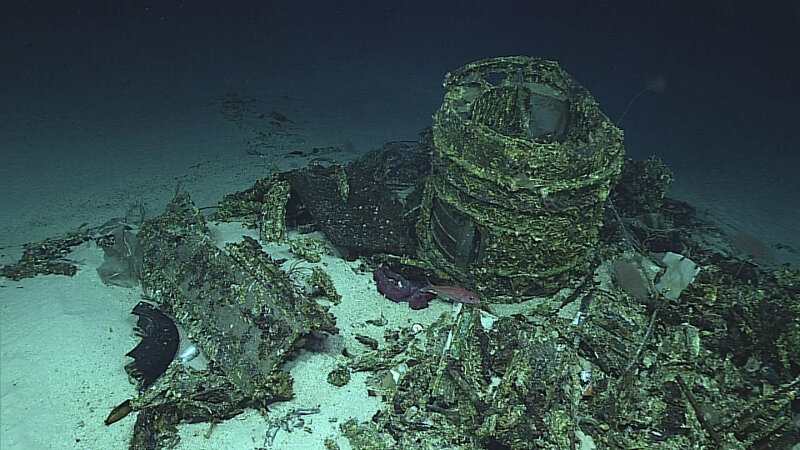 The forward gun turret, located some distance from the wing, is evidence that the aircraft broke apart.