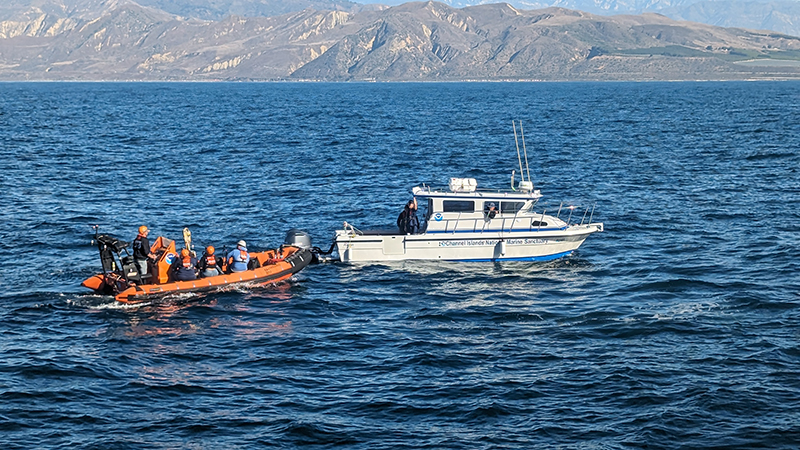After a week-long stay on NOAA Ship Okeanos Explorer, Mia and Keli Lopez are transferred to Channel Islands National Marine Sanctuary's Research Vessel Minke to be shuttled back to land.
